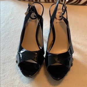 High Heel sandals by Guess black patten